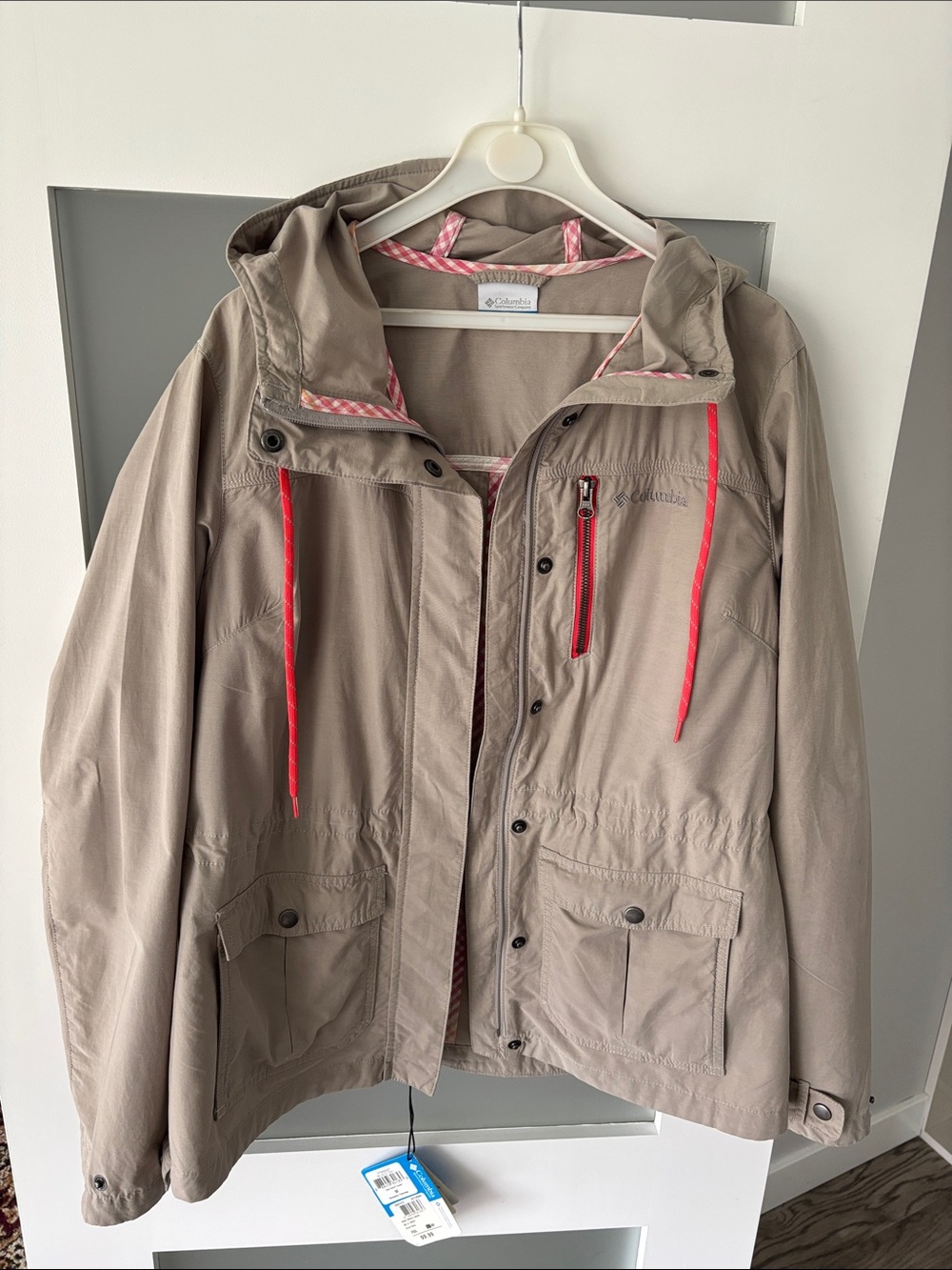 Columbia Taupe Jacket with Coral Accents and Pink Lining